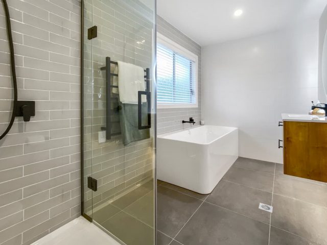 Bathroom by Generation Plumbing